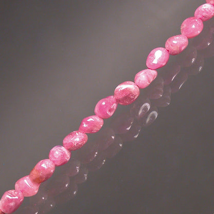 Pink tourmaline called 'Rubellite', bracelet from 17 to 21cm, necklace from 42cm and sautoir from 60cm. Naturally shaped 'Seed' type beads mounted on high-strength wire!