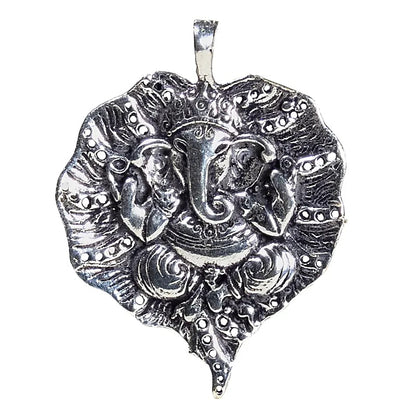 Pendant of the Hindu god Ganesh (or Ganesha, Ganapati), also known as the Elephant God, the lord who bestows good luck, prosperity, and success. 4.5 centimeters - 8 grams / Sold with an adjustable black leather cord!