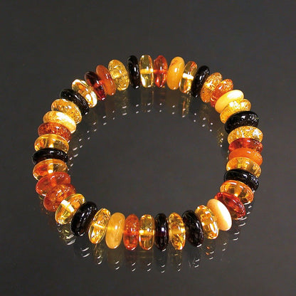 Amber, 9-millimeter 'lozenge' bead bracelet, 18 centimeters long. AA to AAA quality, high-strength elastic thread, superb beads, lightweight and incredibly soft!