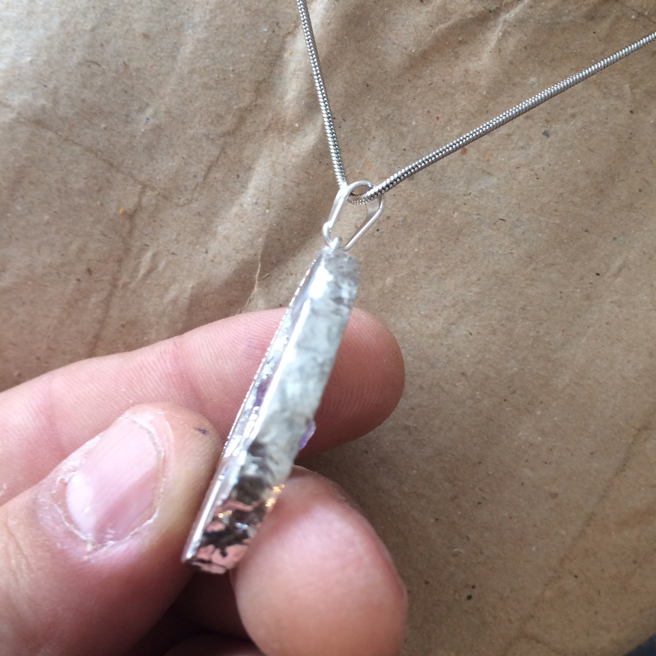 Amethyst, 'mini-geode' pendant called 'géodinhos', 45mm high x 24 wide x 7 thick. Sold with adjustable black cord!