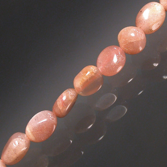 pierre de soleil, bracelet de 17 à 21cm, collier de 42cm et sautoir de 60cm. Perles de type 'Graine' de formes naturelles montées sur fil de haute résistance !