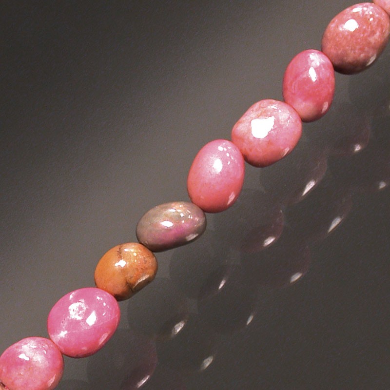 Rhodonite, bracelet de 17 à 21cm, collier de 42cm et sautoir de 60cm. Perles de type 'Graine' de formes naturelles montées sur fil de haute résistance !