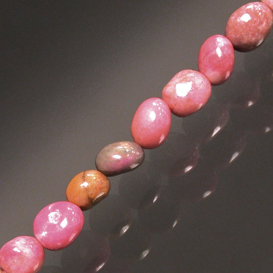 Rhodonite, bracelet de 17 à 21cm, collier de 42cm et sautoir de 60cm. Perles de type 'Graine' de formes naturelles montées sur fil de haute résistance !