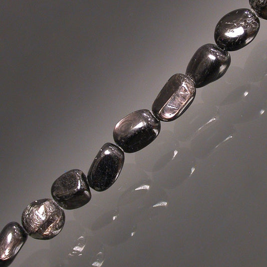 Hypersthène, bracelet de 17 à 21cm, collier de 42cm et sautoir de 60cm. Perles de type 'Graine' de formes naturelles montées sur fil de haute résistance !