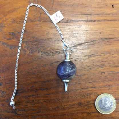 A selection of pendulums, available in plain or chain versions, with 7 chakras. Perfect for dowsing, professionals, and beginners!