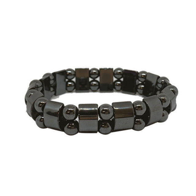Bracelet en plaquette et perle d'hématite. Dimension : Plaquette d'environ 11 millimètres. Monté sur élastique haute résistance !
