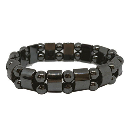 Bracelet en plaquette et perle d'hématite. Dimension : Plaquette d'environ 11 millimètres. Monté sur élastique haute résistance !