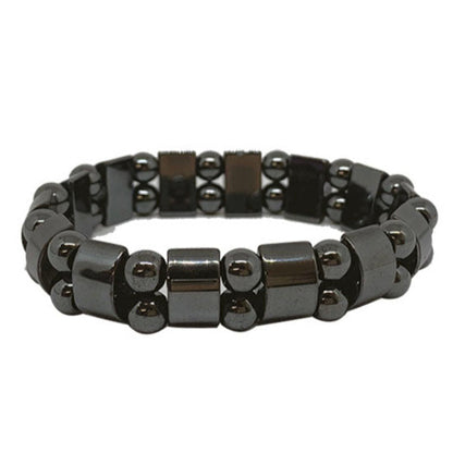 Bracelet en plaquette et perle d'hématite. Dimension : Plaquette d'environ 11 millimètres. Monté sur élastique haute résistance !