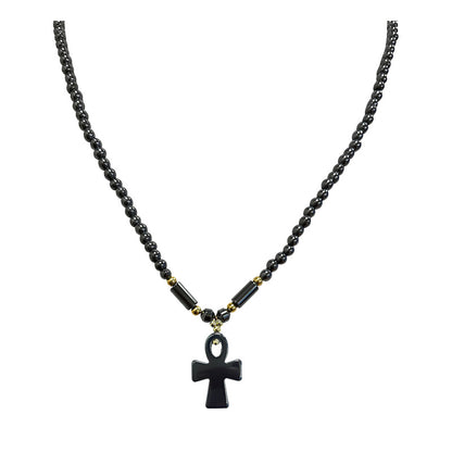Hématite, collier avec pendentif en forme de 'Croix' en perles rondes de 6 mm. 47 centimètres de longueur. 3 finitions au choix pour le système de fermeture (Argent, plaqué or, argenté). Une pierre à l'effet métal, superbe !