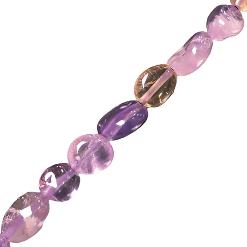 Amétrine, (Améthyste + Citrine), bracelet de 17 à 21cm, collier de 42cm et sautoir de 60cm. Perles de type 'Graine' de formes naturelles montées sur fil de haute résistance !