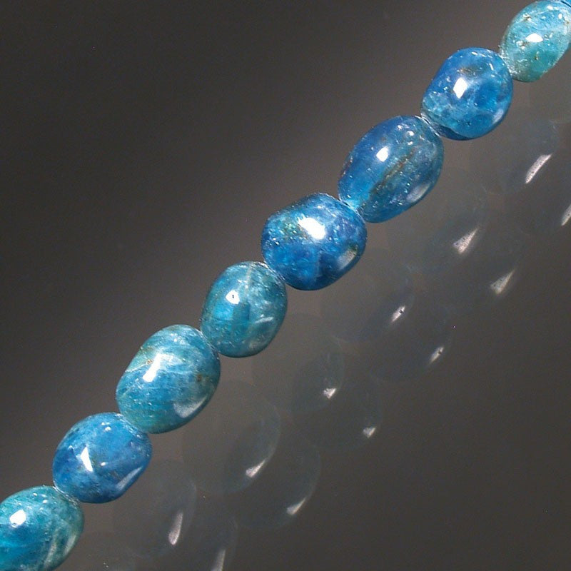 Apatite bracelet de 17 à 21cm, collier de 42cm et sautoir de 60cm. Perles de type 'Graine' de formes naturelles montées sur fil de haute résistance !
