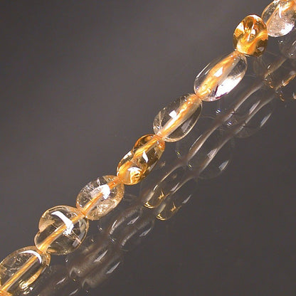 Citrine, bracelet de 17 à 21cm, collier de 42cm et sautoir de 60cm. Perles de type 'Graine' de formes naturelles montées sur fil de haute résistance !
