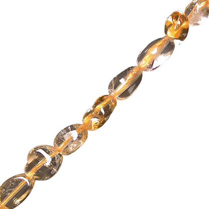 Citrine, bracelet de 17 à 21cm, collier de 42cm et sautoir de 60cm. Perles de type 'Graine' de formes naturelles montées sur fil de haute résistance !