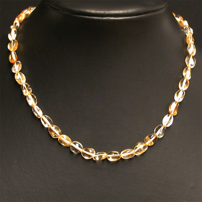 Citrine, bracelet de 17 à 21cm, collier de 42cm et sautoir de 60cm. Perles de type 'Graine' de formes naturelles montées sur fil de haute résistance !