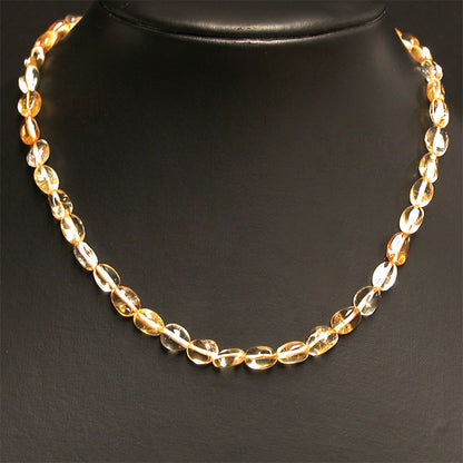 Citrine, bracelet de 17 à 21cm, collier de 42cm et sautoir de 60cm. Perles de type 'Graine' de formes naturelles montées sur fil de haute résistance !