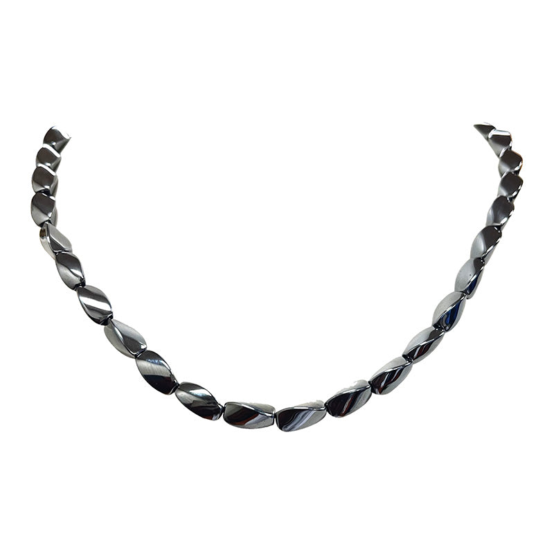 Hématite, perles 'Twist' de 8 x 6 millimètres, vendu en fil de perle, en bracelet de 17 à 21 cm, ou en collier de 42 cm. 3 finitions au choix pour le système de fermeture (Argent, plaqué or, argenté) !