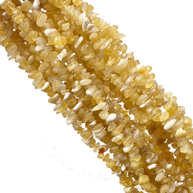 Calcite orange, bracelet de 17 à 21cm, collier de 42cm et sautoir de 60cm. Perles de type 'Graine' de formes naturelles montées sur fil de haute résistance !