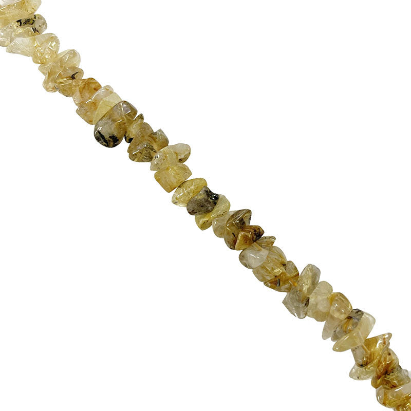 Cristal de roche/ Quartz a rutile doré, bracelet de 17 à 21cm, collier de 42cm et sautoir de 60cm. Perles de type 'Graine' de formes naturelles montées sur fil de haute résistance !