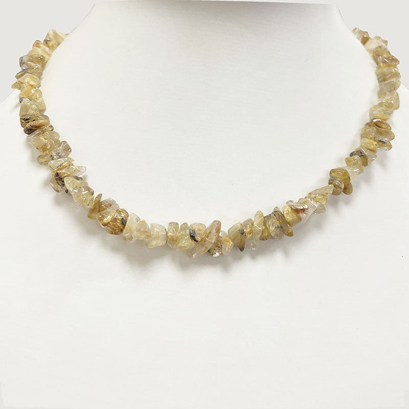 Cristal de roche/ Quartz a rutile doré, bracelet de 17 à 21cm, collier de 42cm et sautoir de 60cm. Perles de type 'Graine' de formes naturelles montées sur fil de haute résistance !