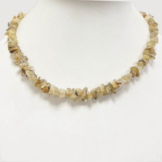 Cristal de roche/ Quartz a rutile doré, bracelet de 17 à 21cm, collier de 42cm et sautoir de 60cm. Perles de type 'Graine' de formes naturelles montées sur fil de haute résistance !