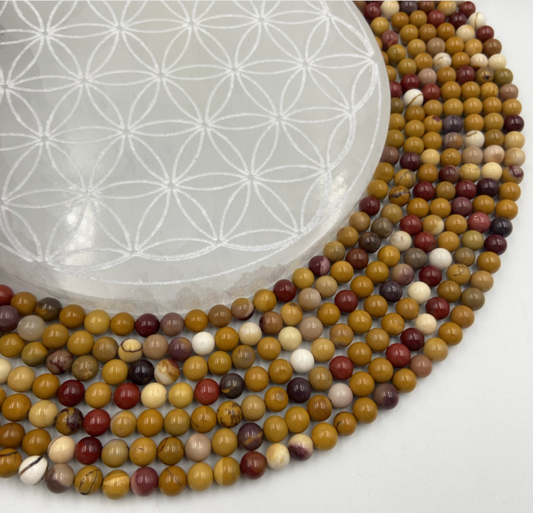 Jaspe Mookaïte, perles rondes de 6 ou 8 mm. Vendu en fil de perle 38/39 cm, en bracelet de 17 à 21cm, en collier de 45 ou sautoir de 60cm. Qualité AA à AAA !