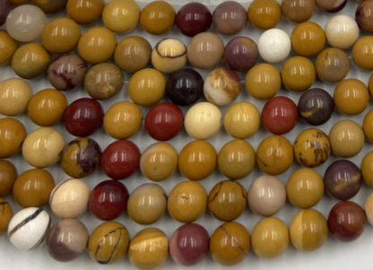 Jaspe Mookaïte, perles rondes de 6 ou 8 mm. Vendu en fil de perle 38/39 cm, en bracelet de 17 à 21cm, en collier de 45 ou sautoir de 60cm. Qualité AA à AAA !