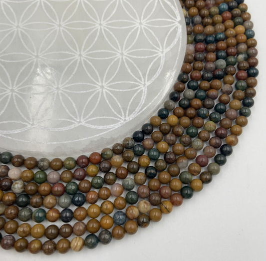 Jaspe Polychrome/ Océan - Perles rondes de 6 ou 8 mm. Vendu en fil de perle 38/39 cm, en bracelet de 17 à 21cm, en collier de 45 ou sautoir de 60cm. Qualité AA à AAA !