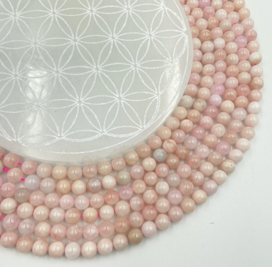 Morganite, perles rondes de 6 et 8 mm, vendu en fil de perle 38/39 cm, en bracelet de 17 à 21cm, en collier de 45 ou sautoir de 60cm. Qualité AA à AAA !