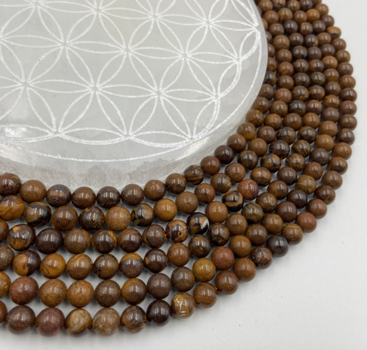 Opale Boulder d'Australie, perles rondes de 6 ou 8 mm. Vendu en fil de perle 38/39 cm, en bracelet de 17 à 21cm, en collier de 45 ou sautoir de 60cm. Qualité AA à AAA !