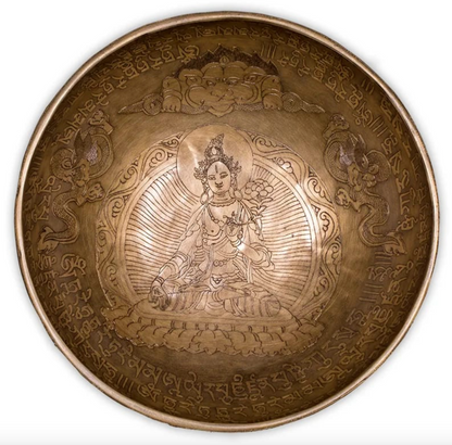 Bowl with engraving of the goddess 'White Tara' on the inside, 28 centimeters - approximately 2200 grams. Sold with a suitable mallet! Magnificent piece 'handmade' in Nepal