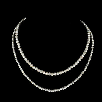 Perles Biwa ! Collier multi-rangs (2), en perles de formes naturelles. Finition en Argent et perles de 3/4 millimètres. Longueur 40 centimètres.