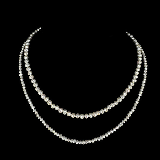 Perles Biwa ! Collier multi-rangs (2), en perles de formes naturelles. Finition en Argent et perles de 3/4 millimètres. Longueur 40 centimètres.