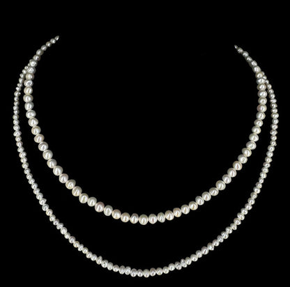 Perles Biwa ! Collier multi-rangs (2), en perles de formes naturelles. Finition en Argent et perles de 3/4 millimètres. Longueur 40 centimètres.