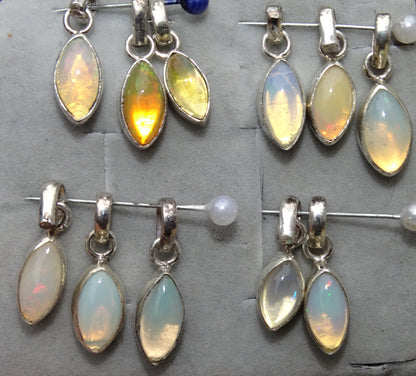 Opale Welo, l'authentique et mythique pierre ! Pendentif monté sur Argent 0.925, dimensions : 12 à 14 millimètres . Pendentif vendu seul ou avec chainette en Argent !