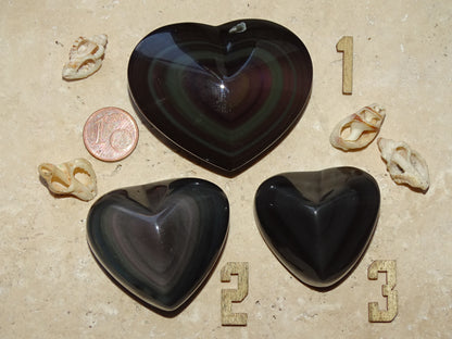 35 to 50 millimeters celestial eye obsidian heart. Beautifully finished, intense reflections, magnificent pieces!