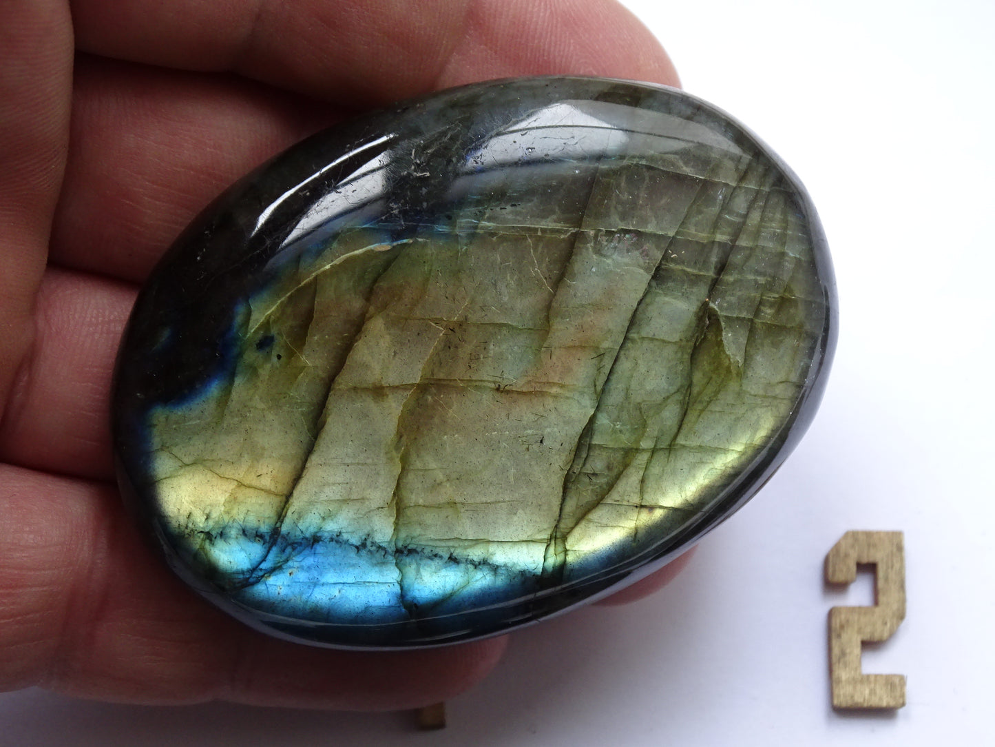 Labradorite, a selection of pebbles/flat stones, in a choice of designs, approximately 6x4x1.5 cm. A good size for massage stones. Very high quality, with incredible hologram reflections, perfect!