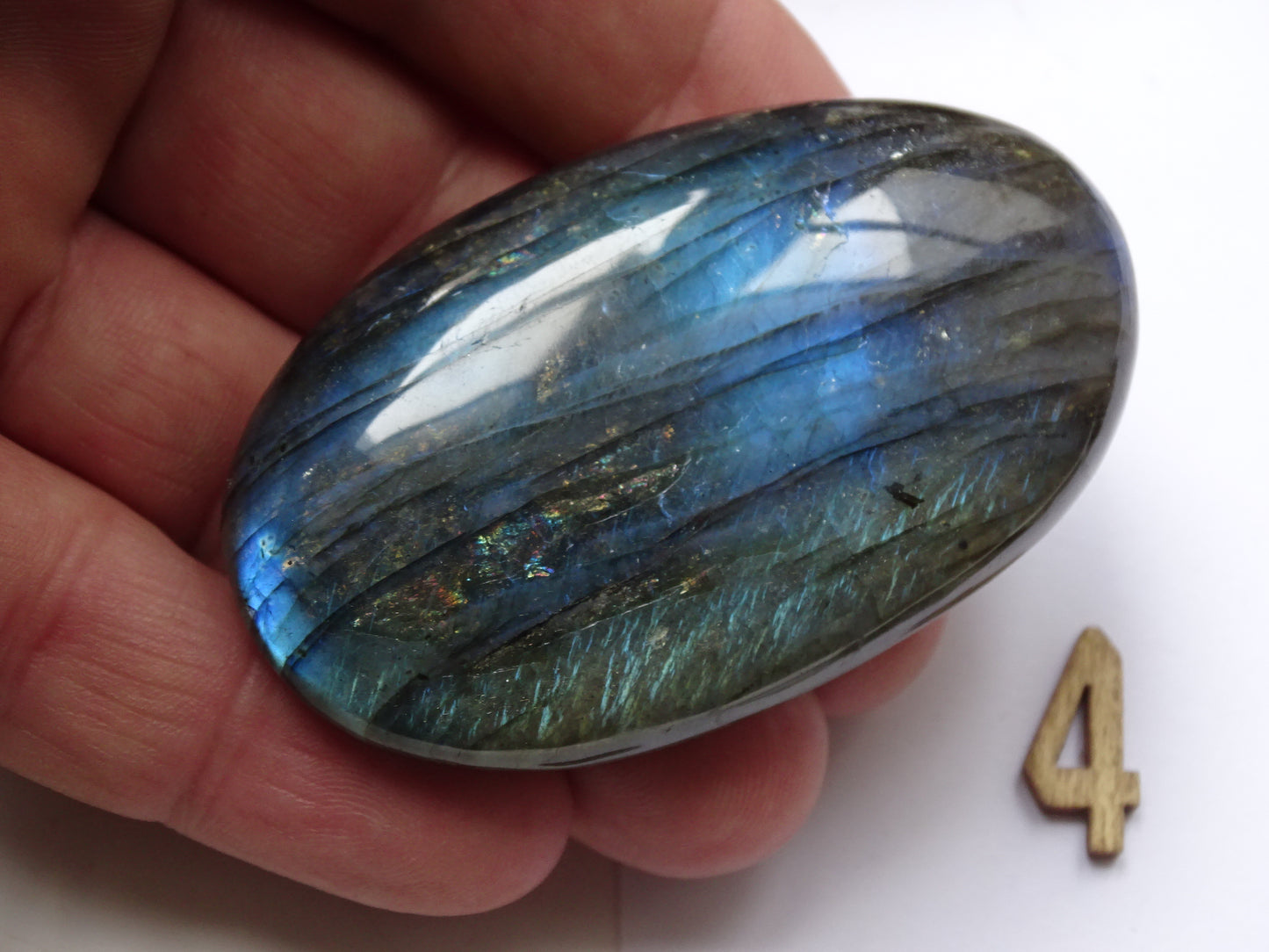 Labradorite, a selection of pebbles/flat stones, in a choice of designs, approximately 6x4x1.5 cm. A good size for massage stones. Very high quality, with incredible hologram reflections, perfect!