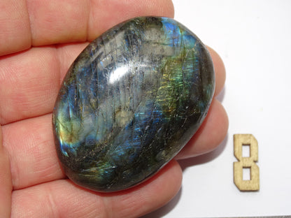 Labradorite, a selection of pebbles/flat stones, in a choice of designs, approximately 6x4x1.5 cm. A good size for massage stones. Very high quality, with incredible hologram reflections, perfect!