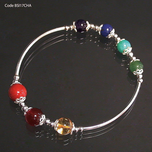 '7 Chakras' bracelet, with 8 millimeter beads and 100% silver tubes. Available in lengths of 17 to 21 cm. AA to AAA quality, superb beads! Made by Gem &amp; Zen