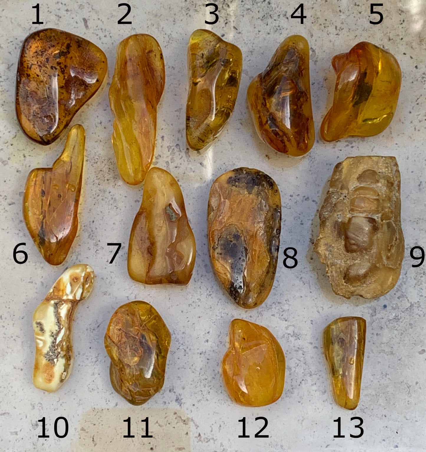 Lithuanian amber, a selection of tumbled (polished) specimens, premium quality. 40x25x15 mm on average! Perfect for jewelry, collecting, etc.