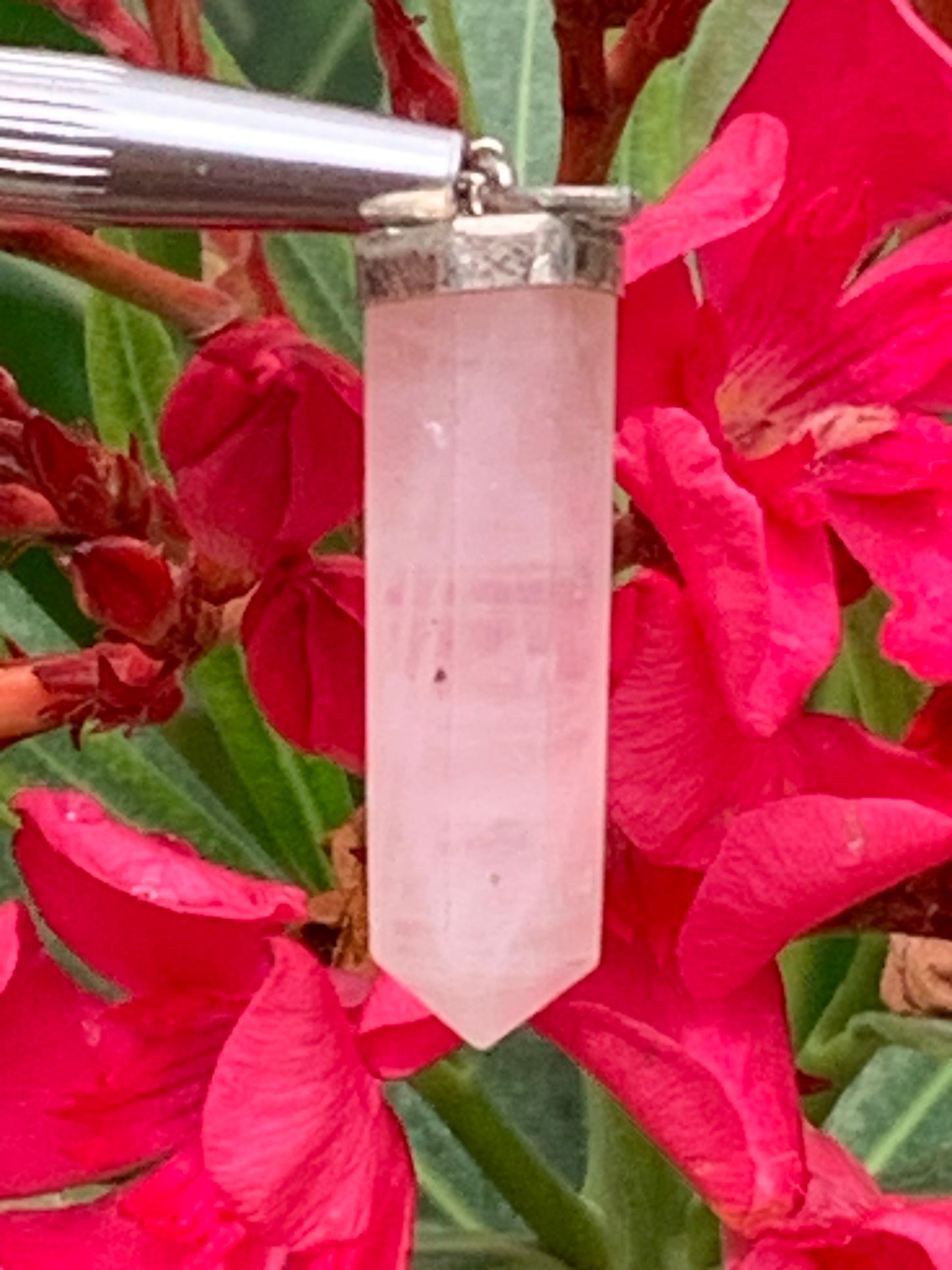 Rock crystal/Rose quartz! Silver point/laser pendant, 42mm high x 9mm diameter. Sold with an adjustable black cord!