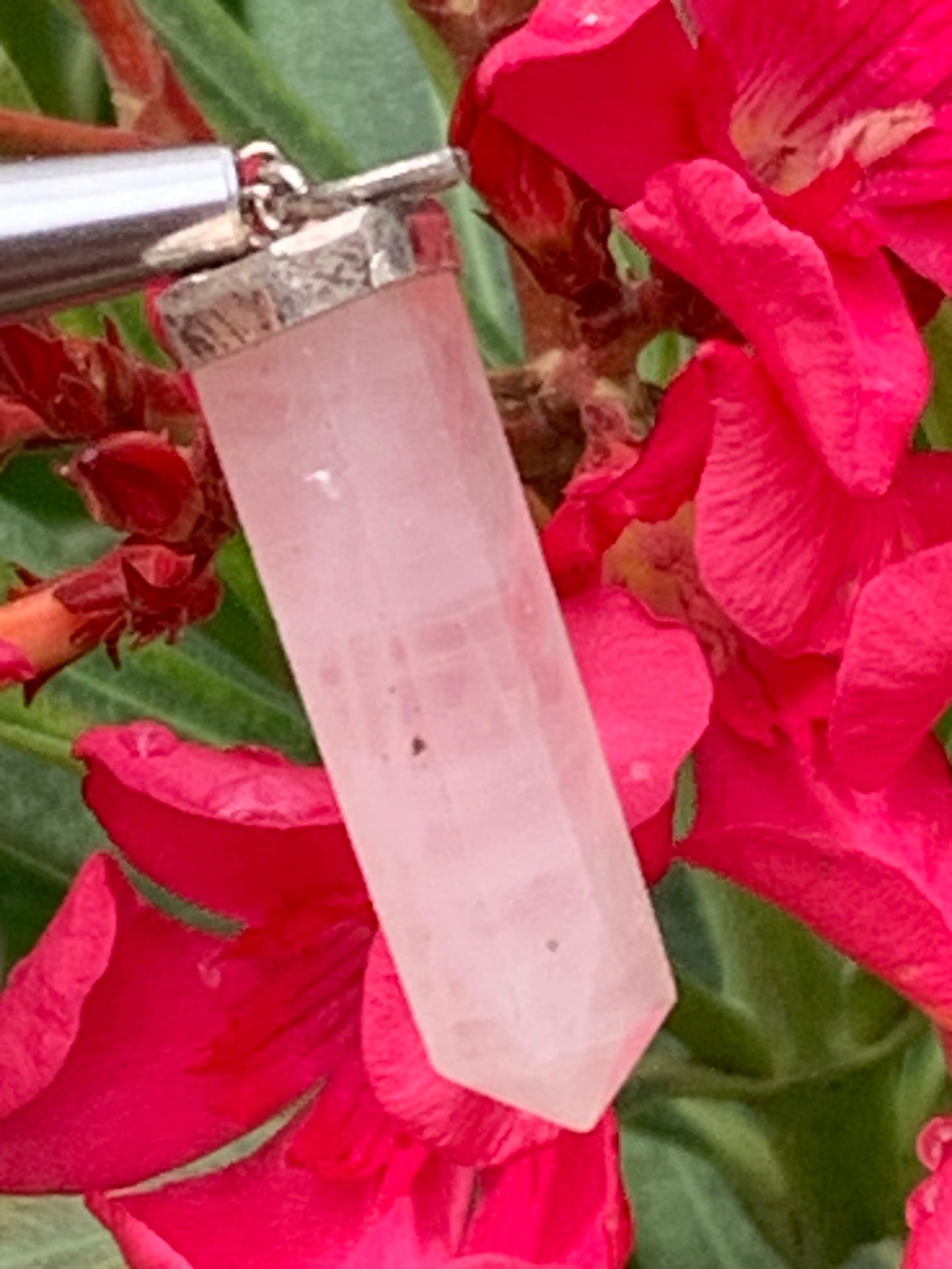 Rock crystal/Rose quartz! Silver point/laser pendant, 42mm high x 9mm diameter. Sold with an adjustable black cord!