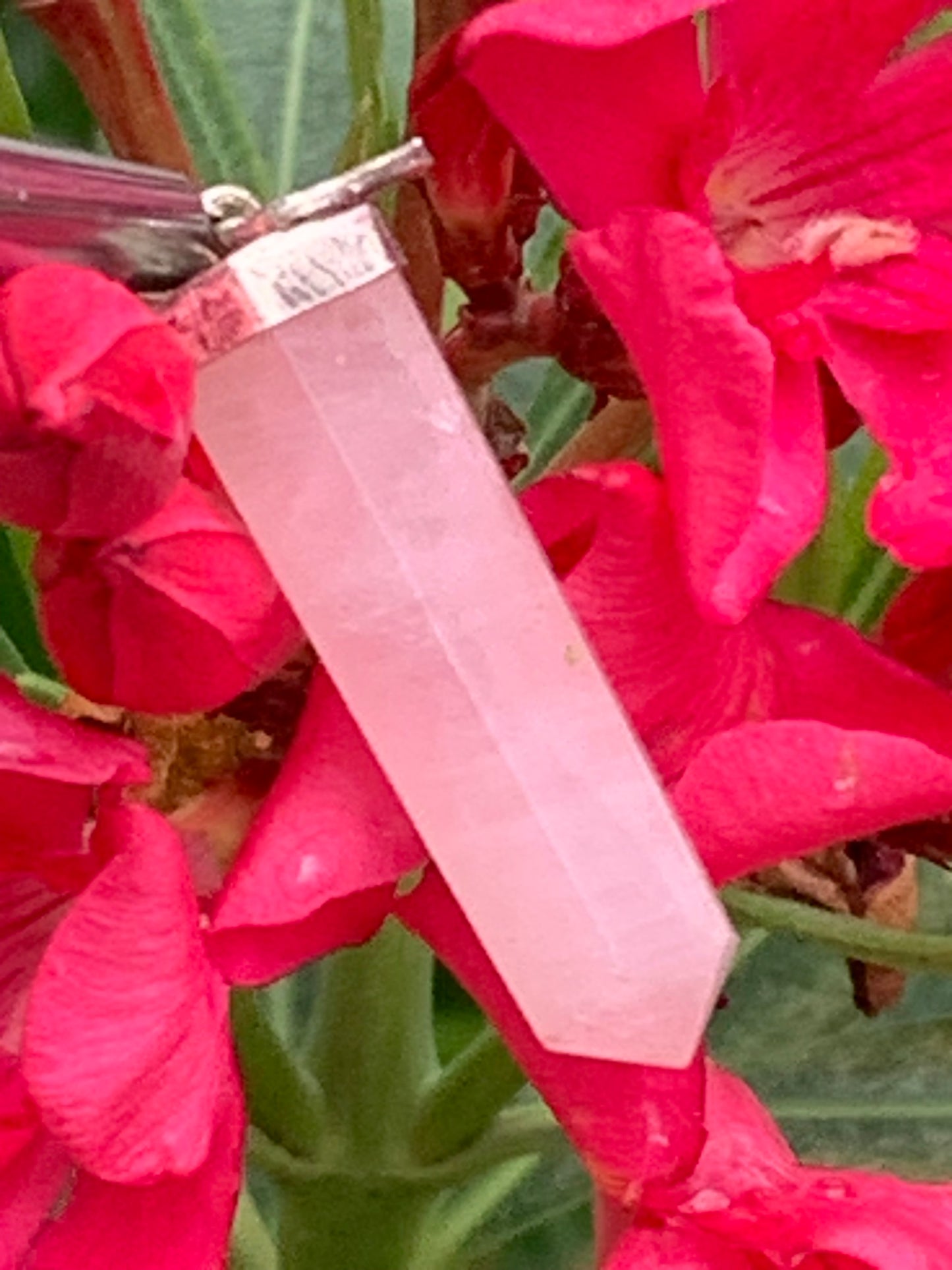 Rock crystal/Rose quartz! Silver point/laser pendant, 42mm high x 9mm diameter. Sold with an adjustable black cord!