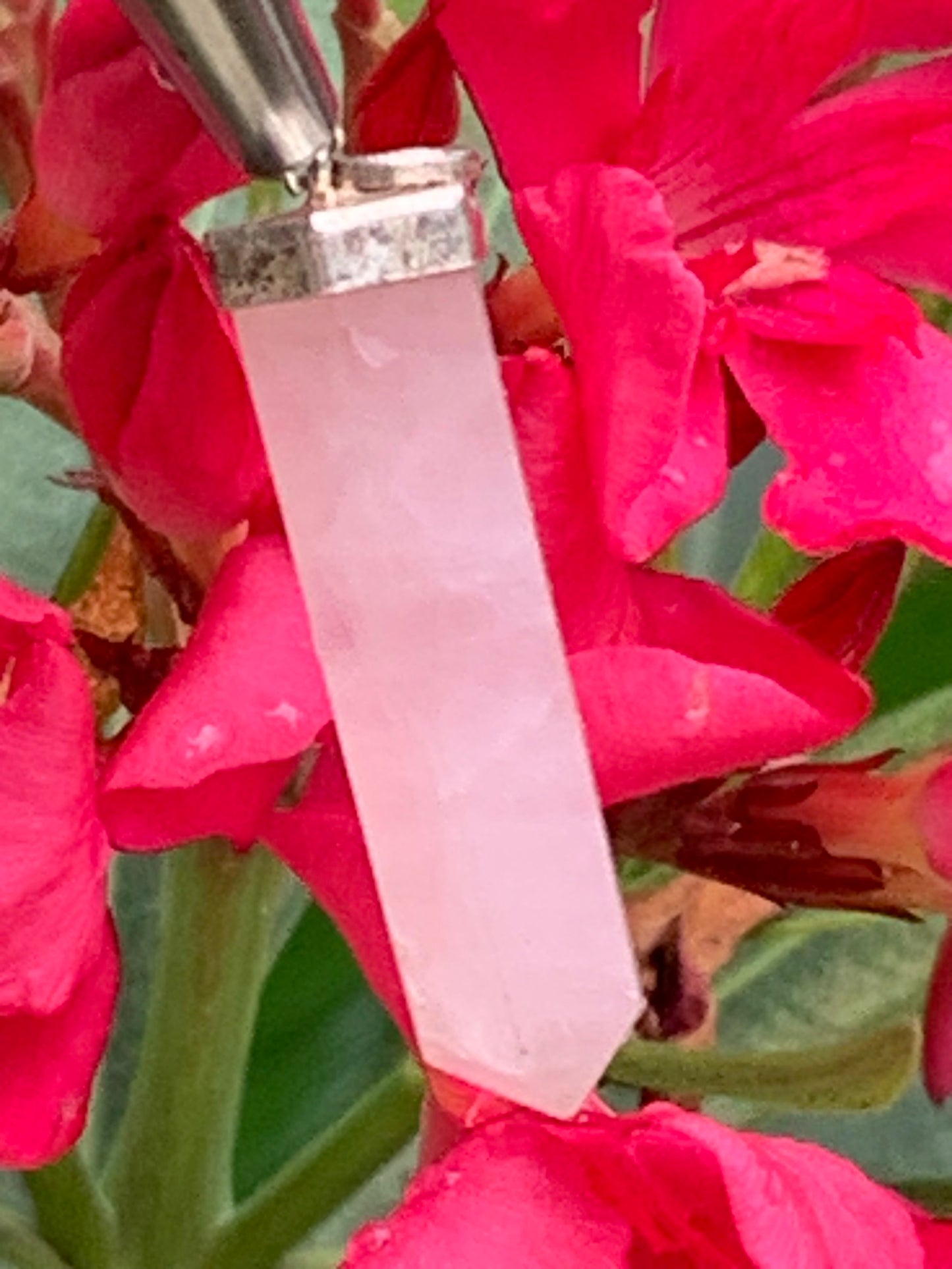 Rock crystal/Rose quartz! Silver point/laser pendant, 42mm high x 9mm diameter. Sold with an adjustable black cord!
