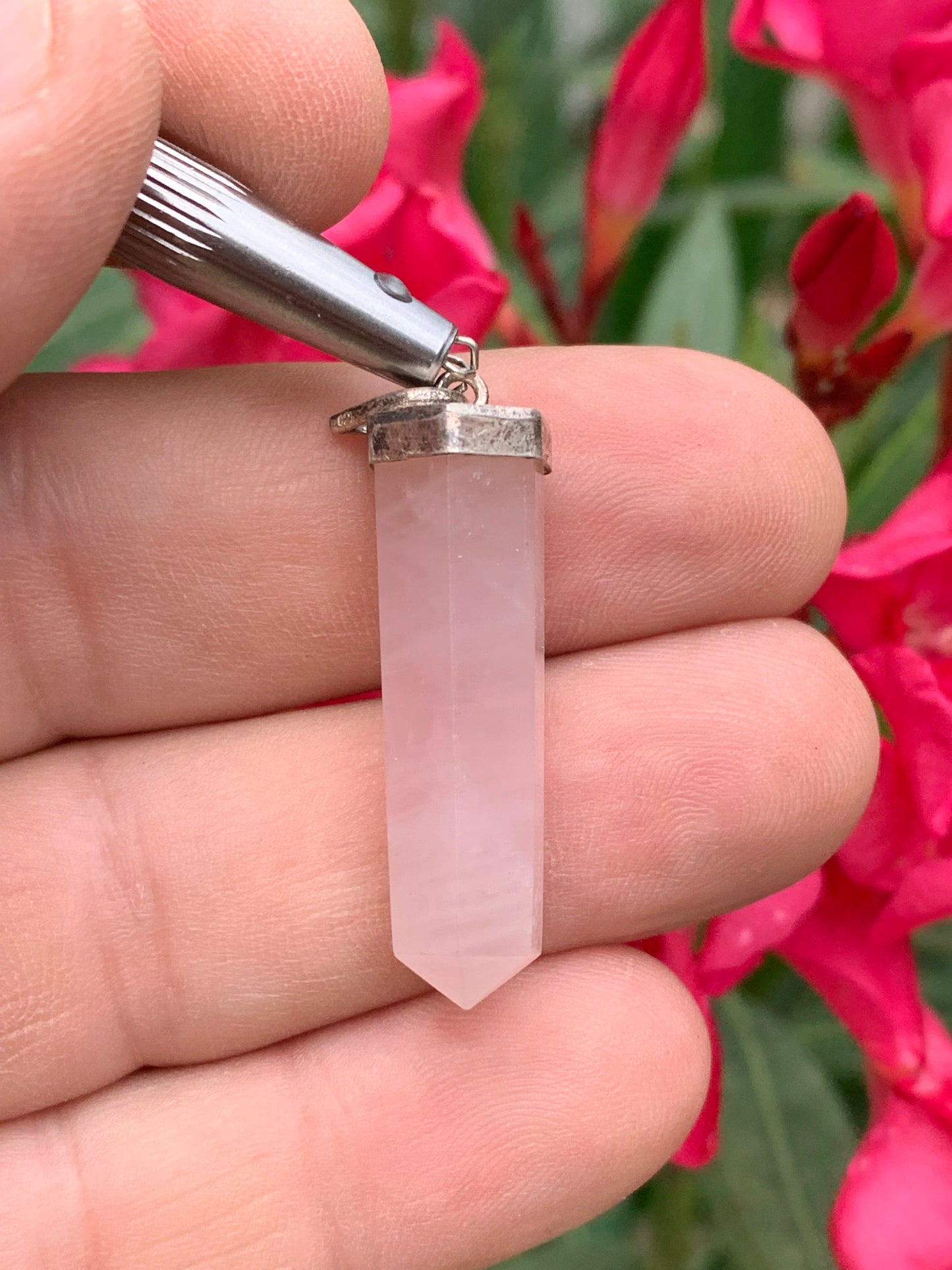 Rock crystal/Rose quartz! Silver point/laser pendant, 42mm high x 9mm diameter. Sold with an adjustable black cord!