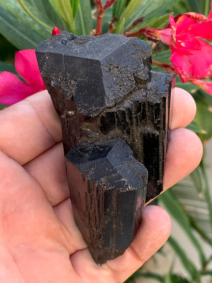 Black tourmaline, natural specimen, twin of 92 x 65 x 50 mm - 263.8 grams. A very beautiful piece with several 3-sided heads! 
