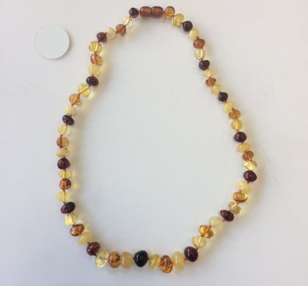 Amber with a 'brilliant' finish, 5/7 millimeter free-form beads, sold in a 44-centimeter necklace. 'Amber screw' clasp system. AA to AAA quality, superb beads, lightweight and incredibly soft!