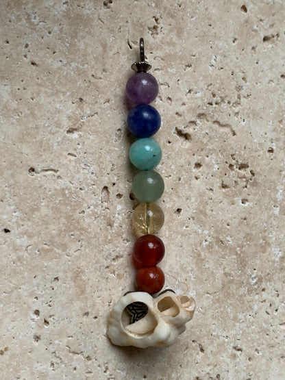 '7 chakras' pendant made by Gem &amp; Zen, choice of 7 beads with or without a natural shell! 52 millimeters high x 6 millimeters in diameter. Sold with an adjustable black cord!