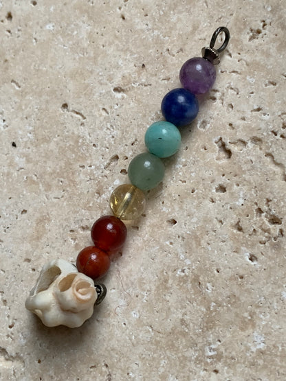 '7 chakras' pendant made by Gem &amp; Zen, choice of 7 beads with or without a natural shell! 52 millimeters high x 6 millimeters in diameter. Sold with an adjustable black cord!