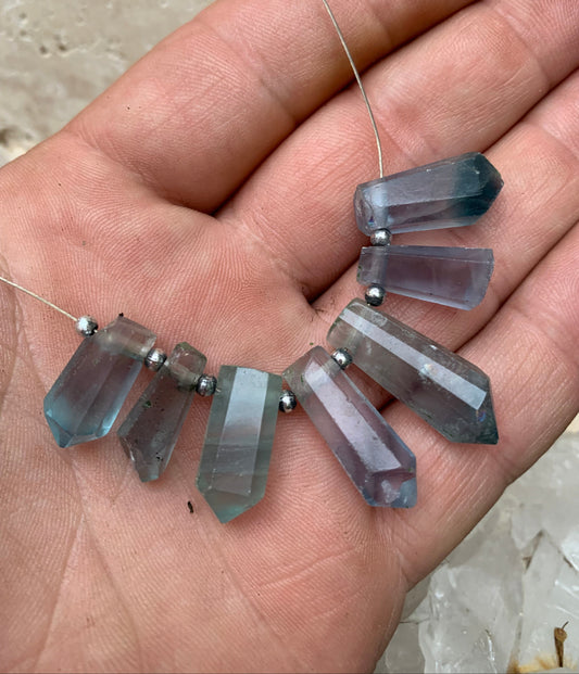 Blue Fluorite (rare), set of 7 drilled crystals 18 to 27 mm x 7 to 8 x 5 to 7. AA to AAA quality, perfect for mounting in jewelry or collection!
